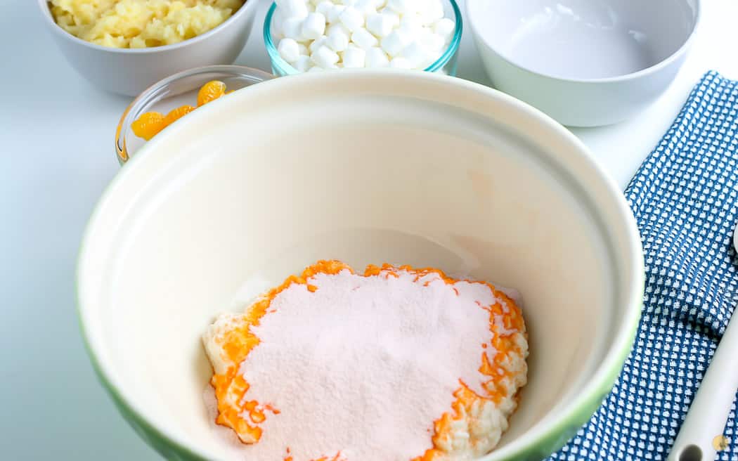 jello powder on cottage cheese in a bowl