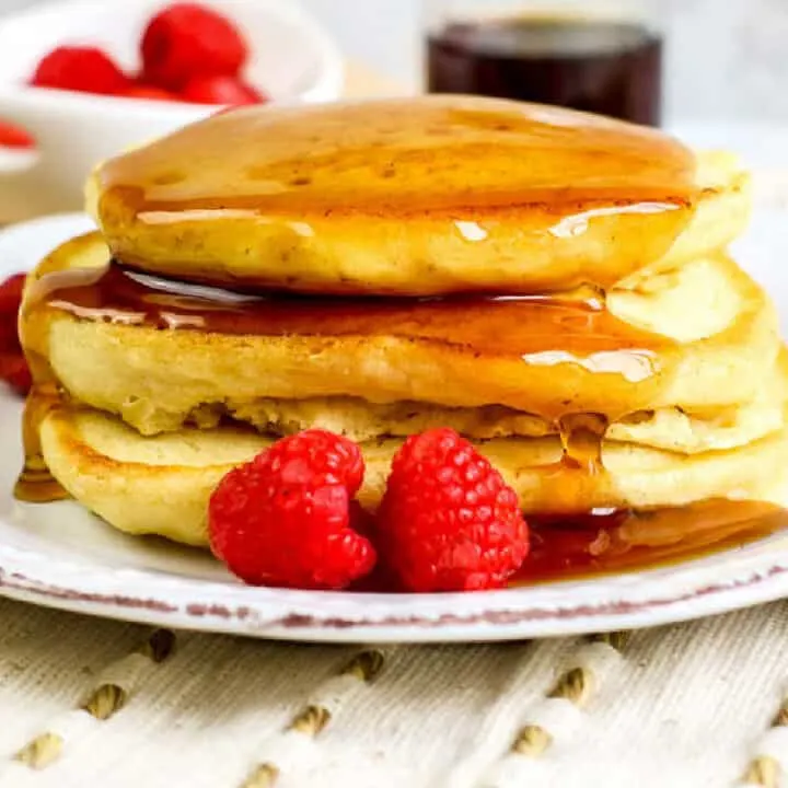 square photo of stack of pancakes
