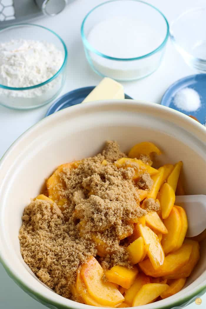 peaches and brown sugar in a bowl