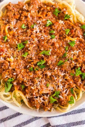 square picture of bowl of spaghetti and meat sauce
