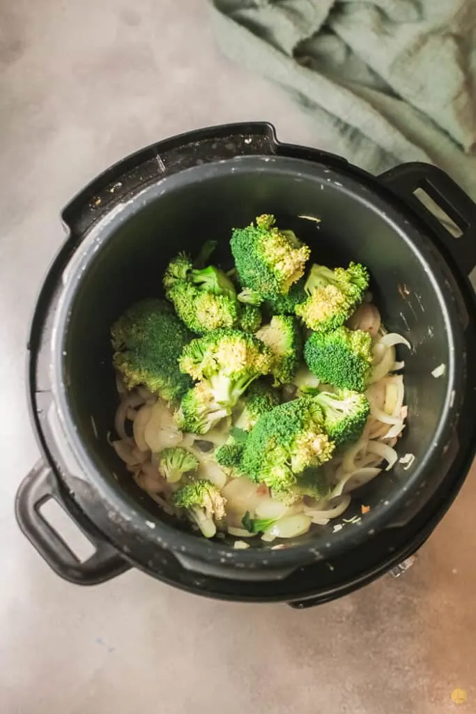 onions and broccoli in an instant pot