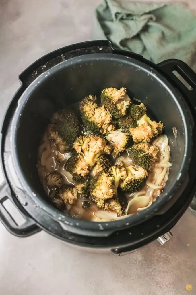 cooked onions and broccoli in an instant pot