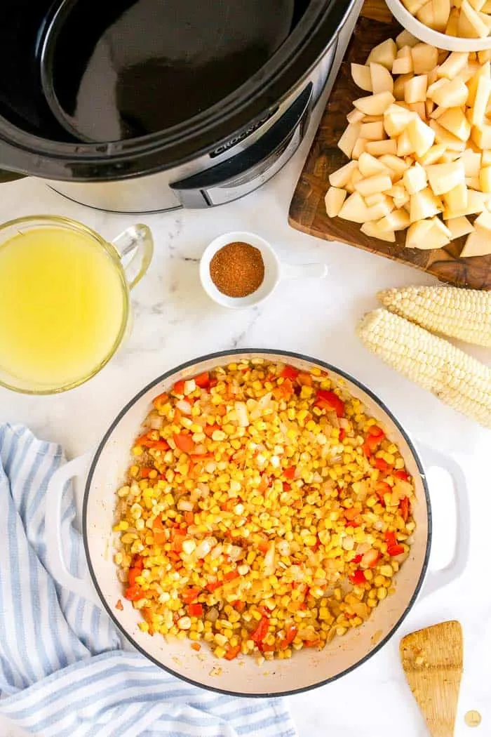 corn and peppers in a pot