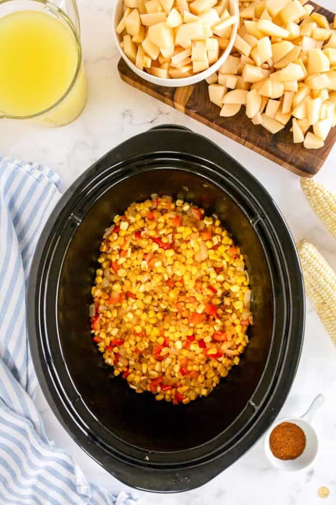 corn and peppers in a slow cooker