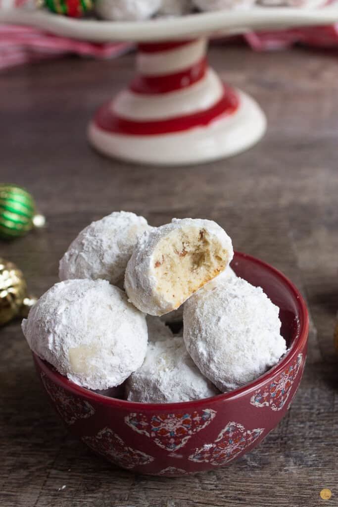 red bowl of white cookies