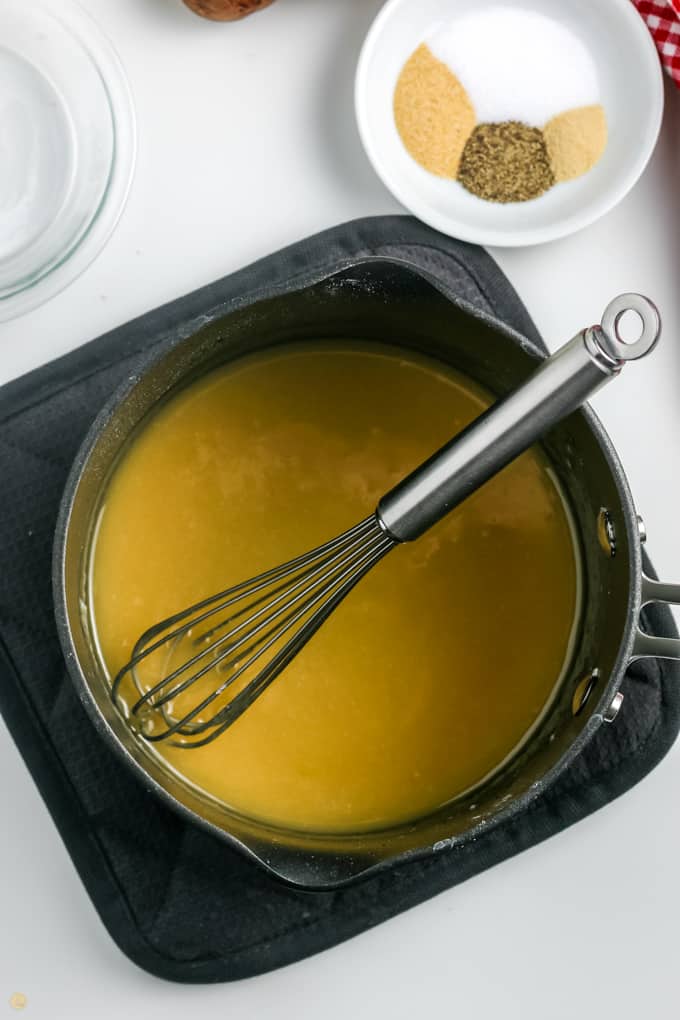 soup and whisk in a pot