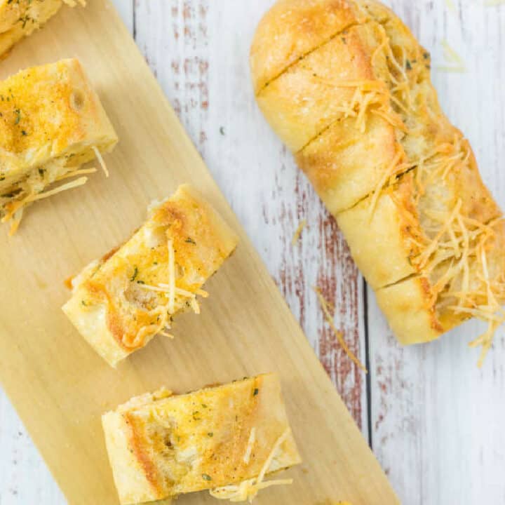 sliced bread on wood plank