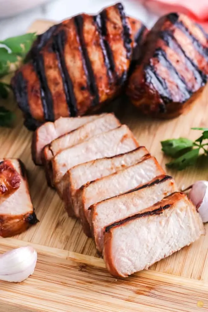 sliced pork on a board