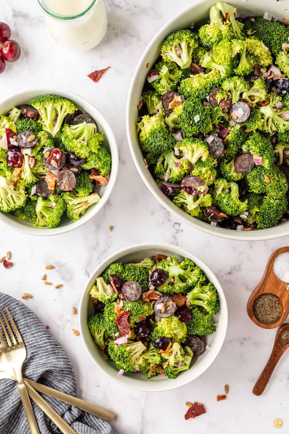 three bowls of salad