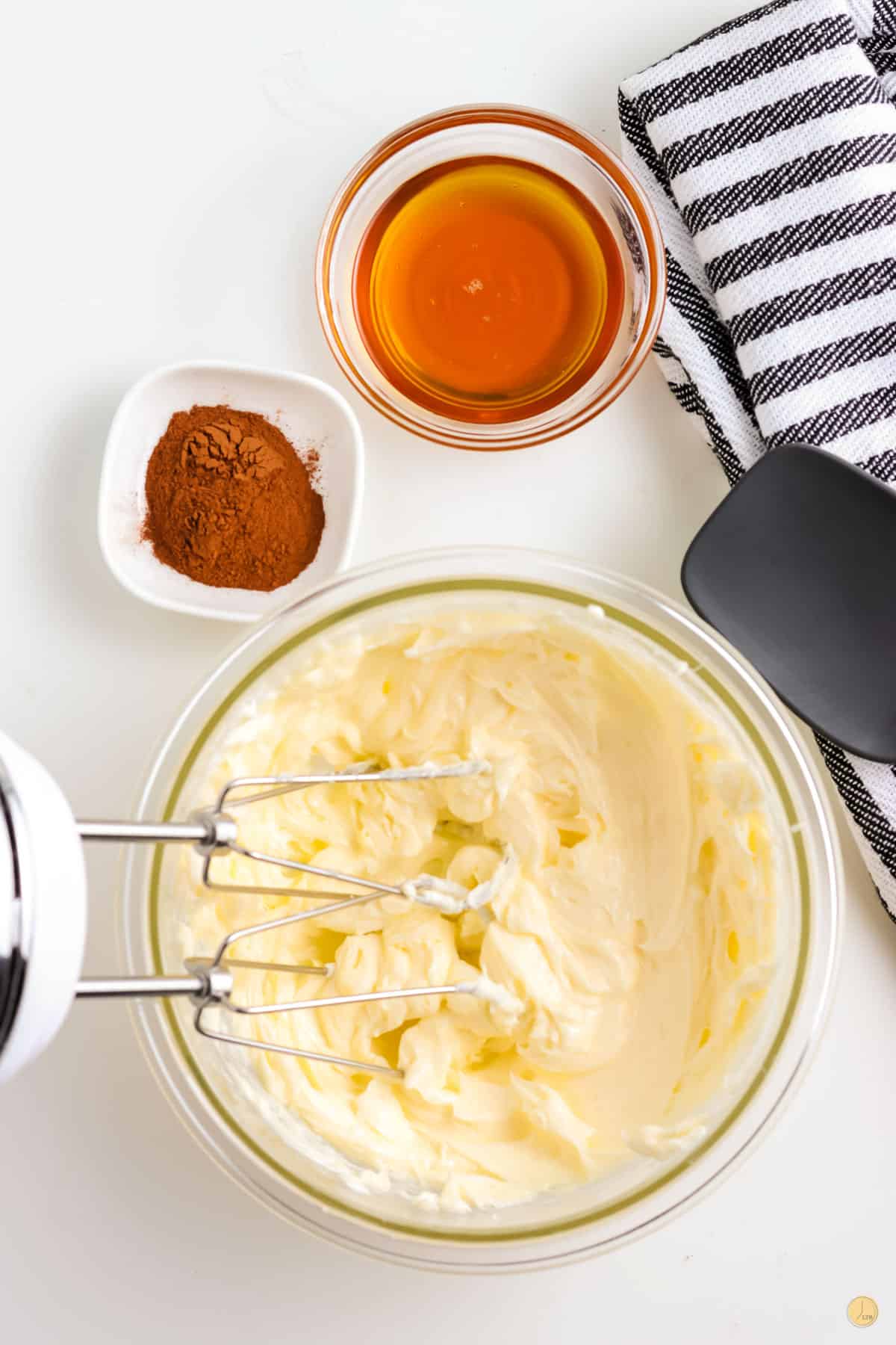 butter and beaters in a bowl