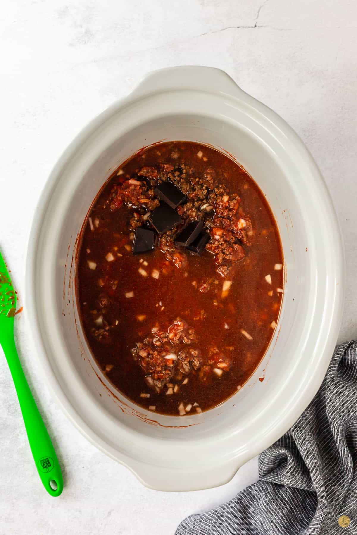 uncooked chili in a crockpot