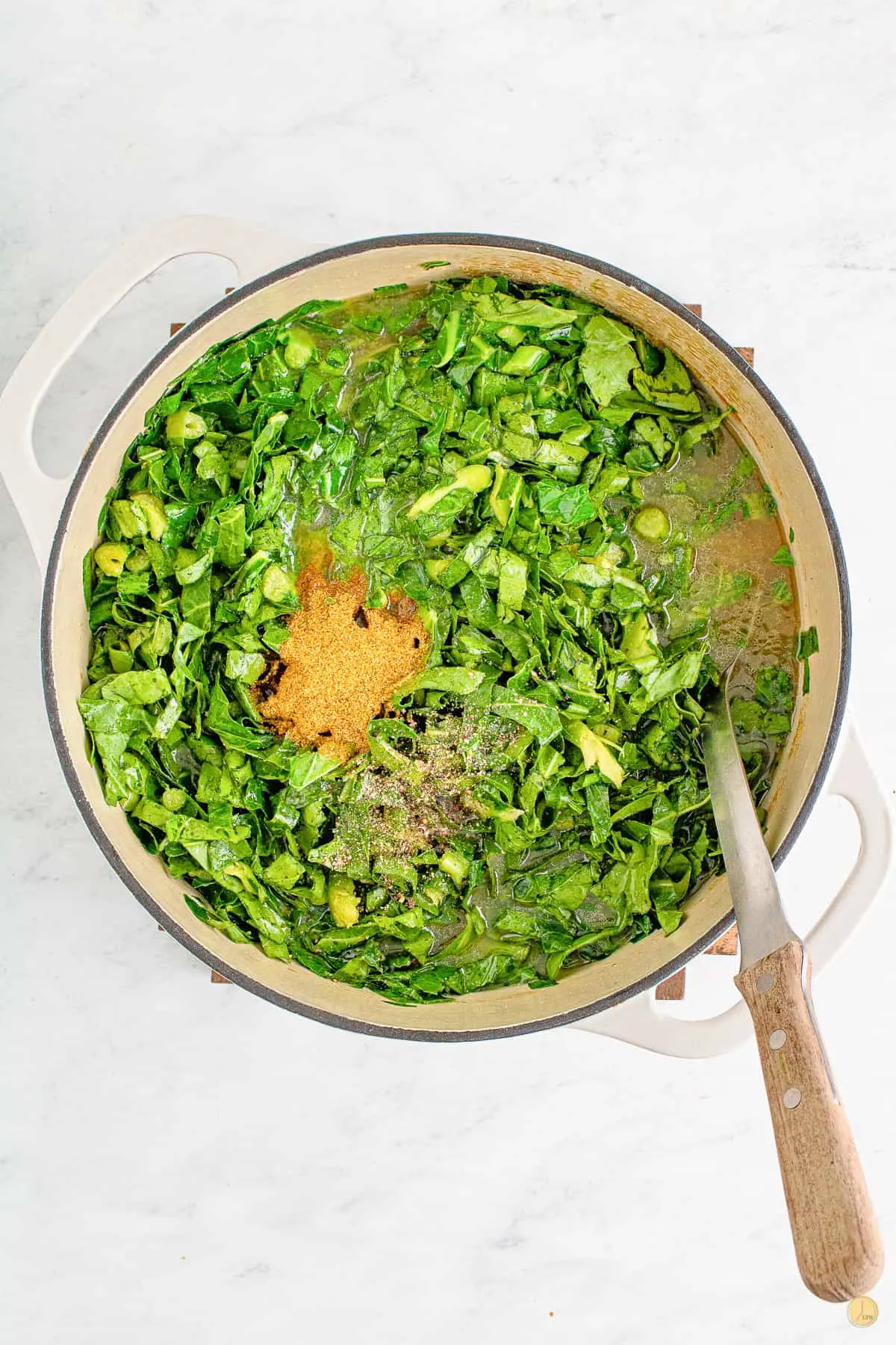 uncooked greens in a pot
