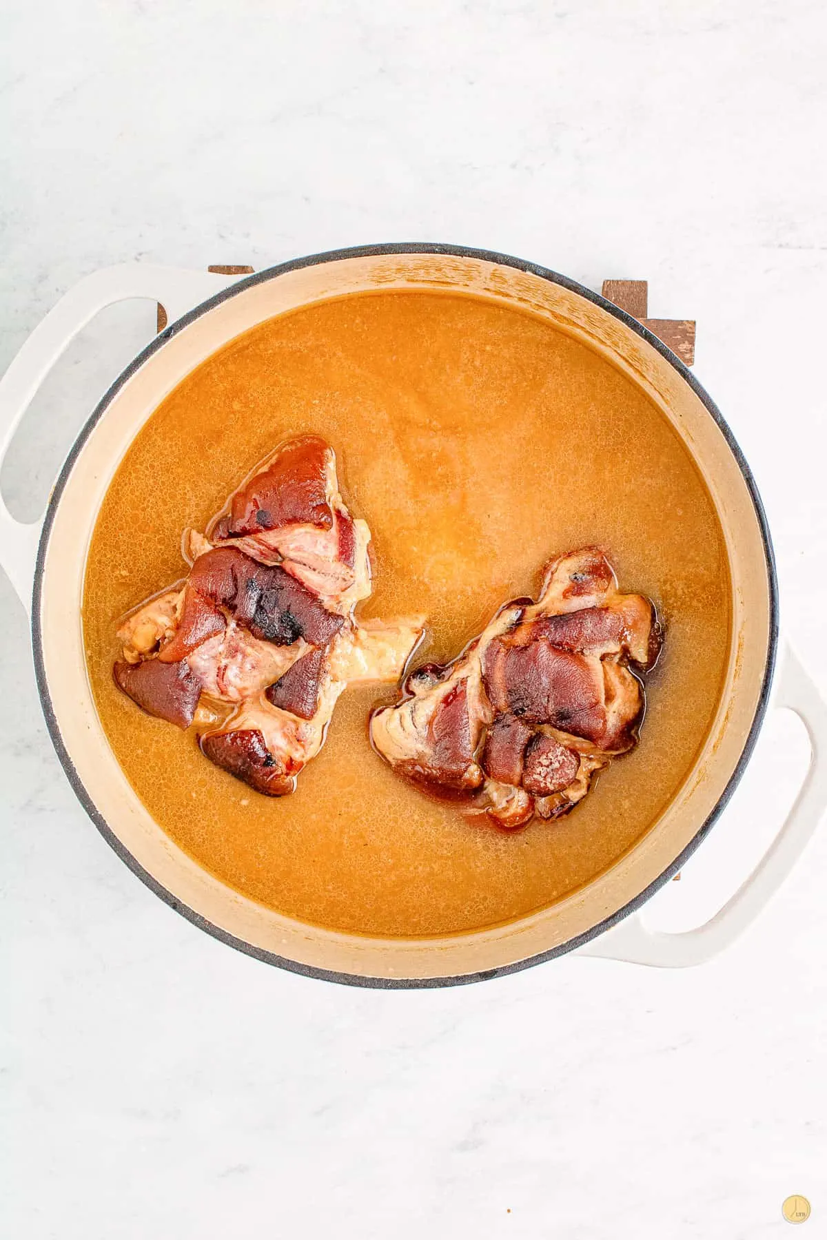 ham and broth in a pot