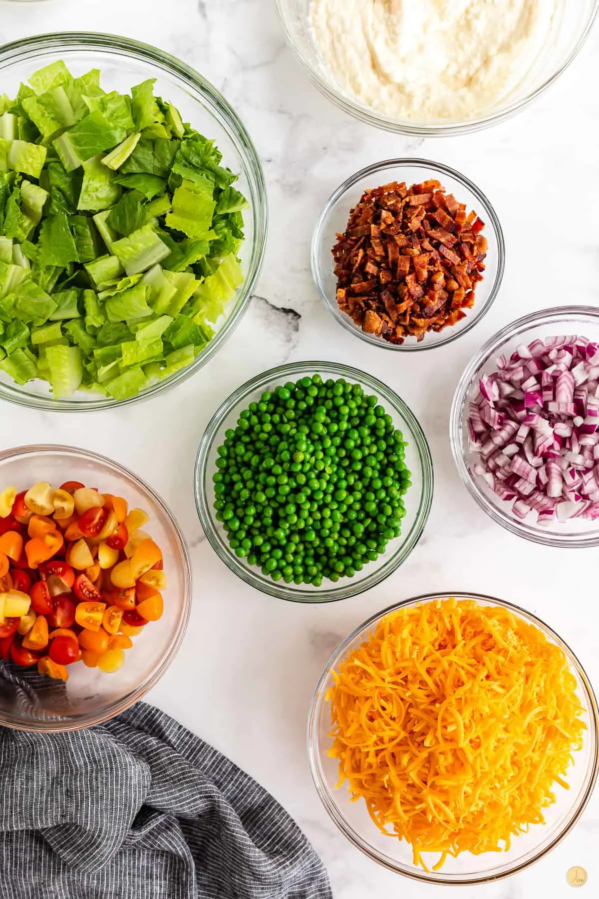 bowls of salad ingredients