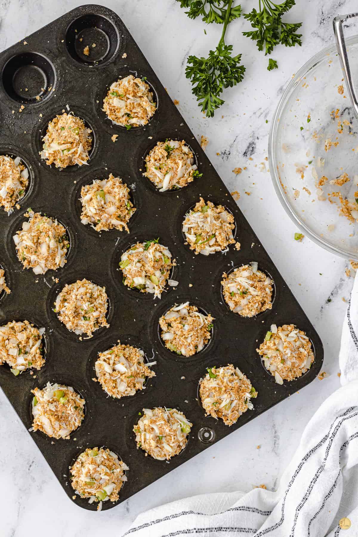 muffin pan with crab