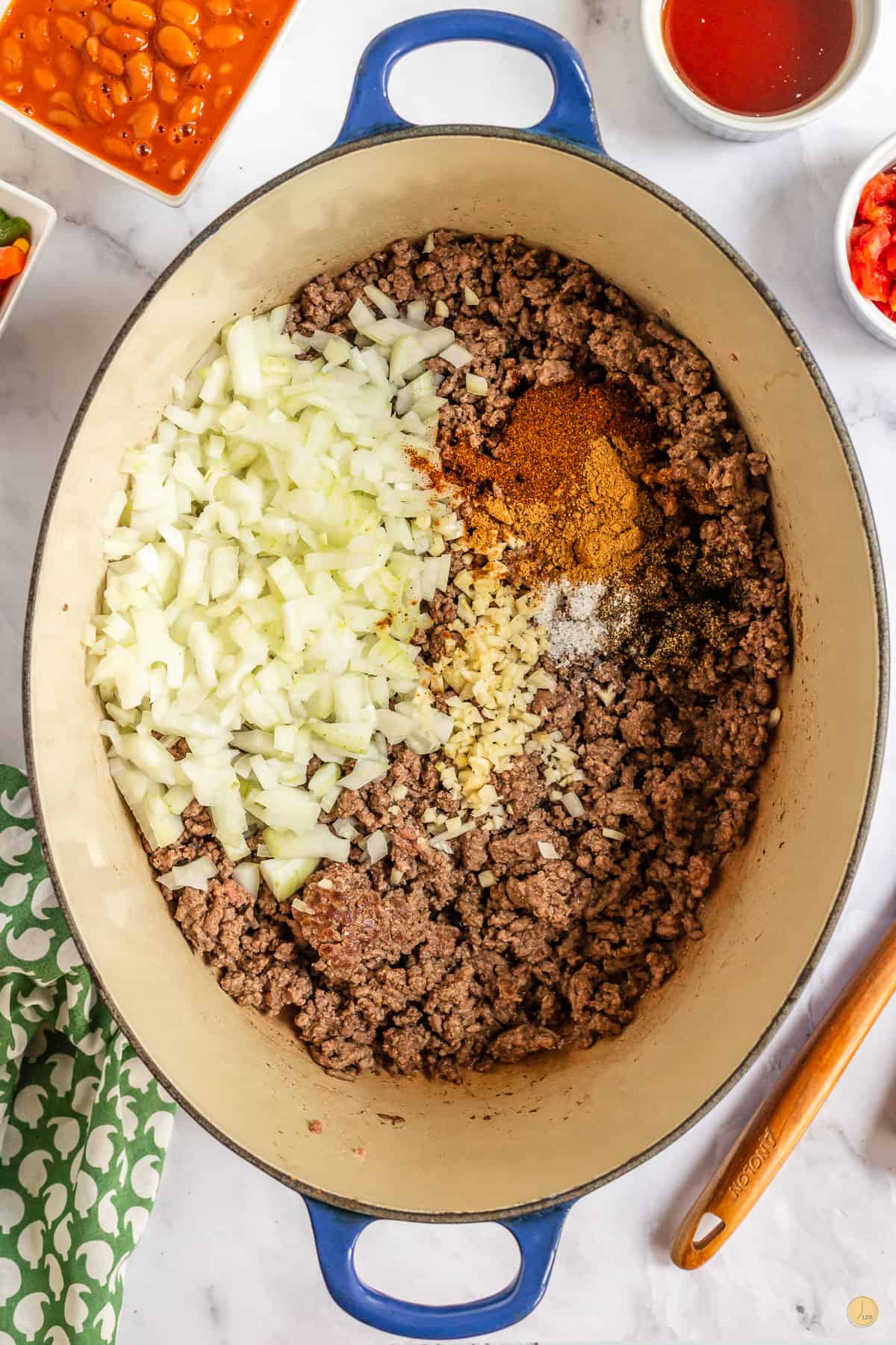 ground beef and onions in a pot