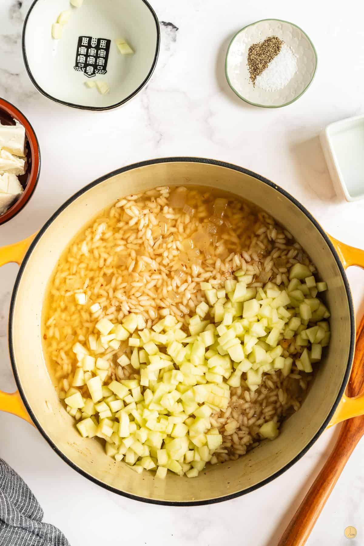 risotto and apple in a pot