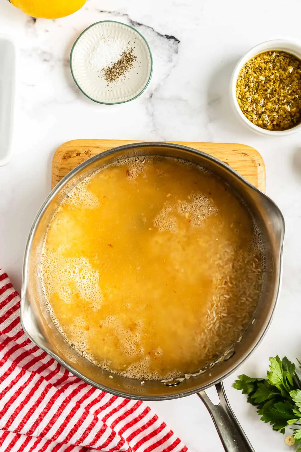 broth and rice in a pan