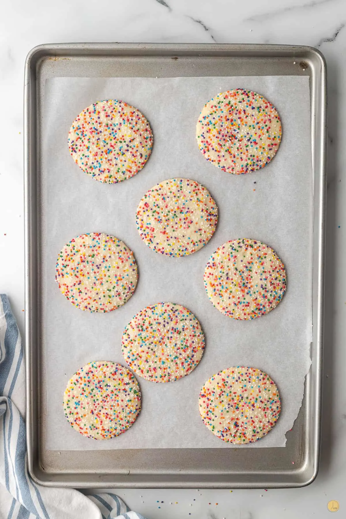 baking sheet with sprinkle cookies