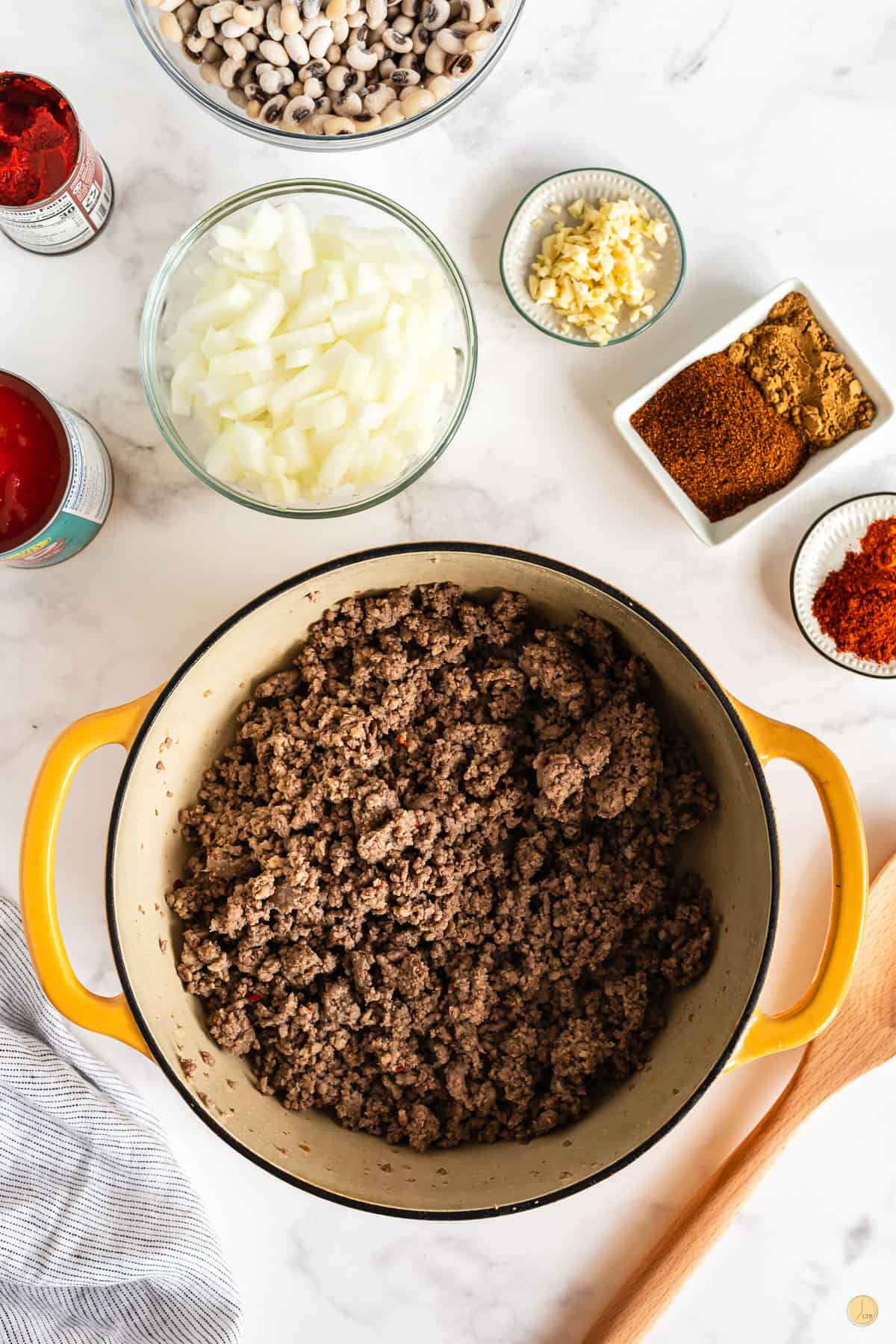 cooked meat in a pot over medium heat