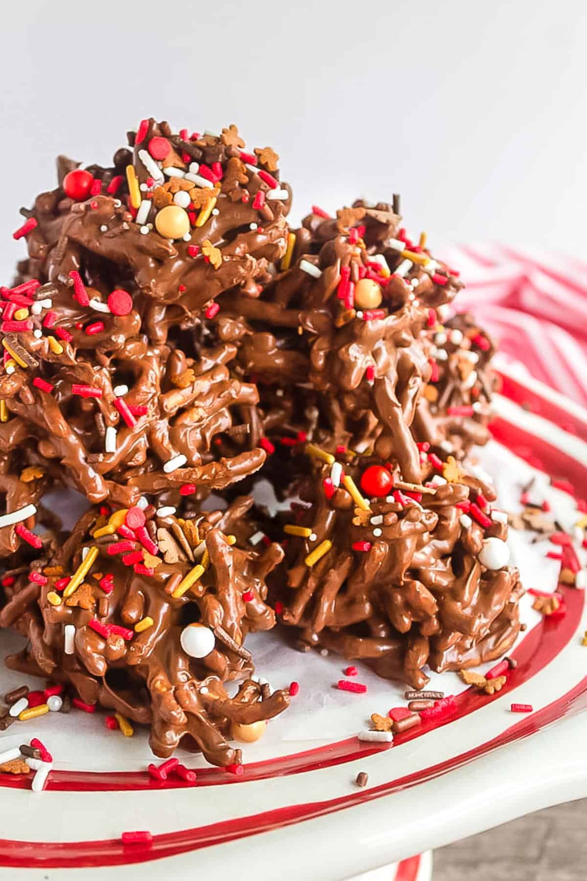 stack of cookies on a red and white platter