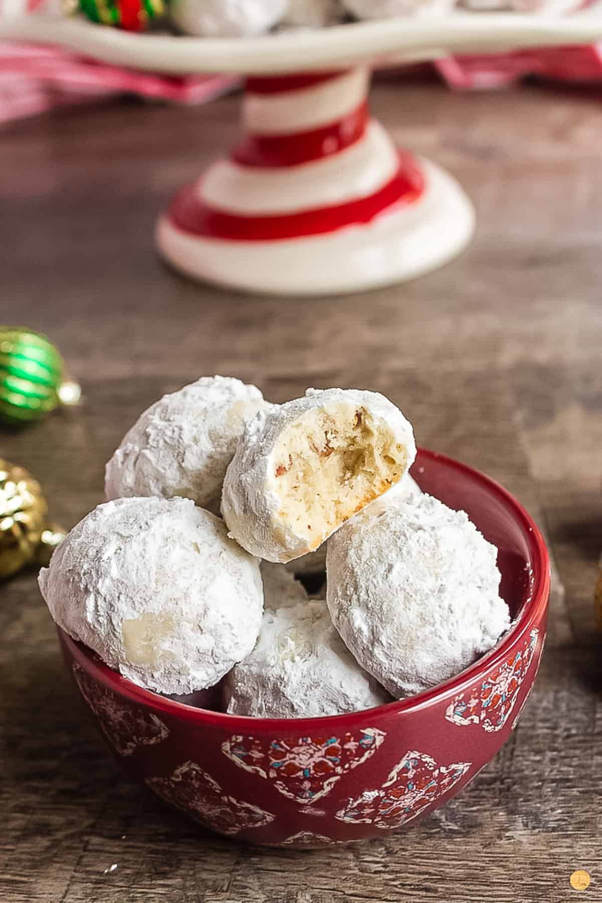 red bowl of white cookies