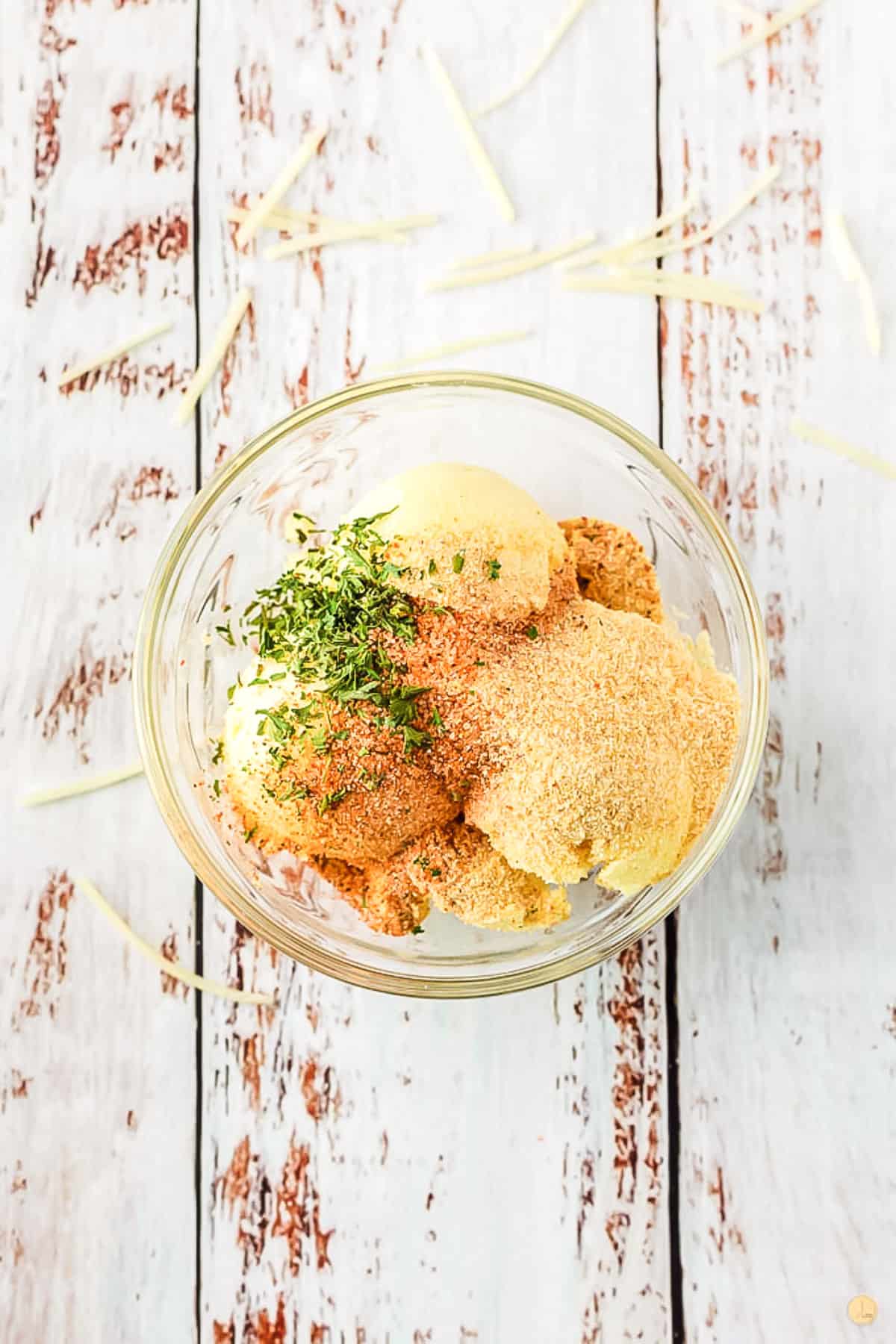 spices and butter in a bowl