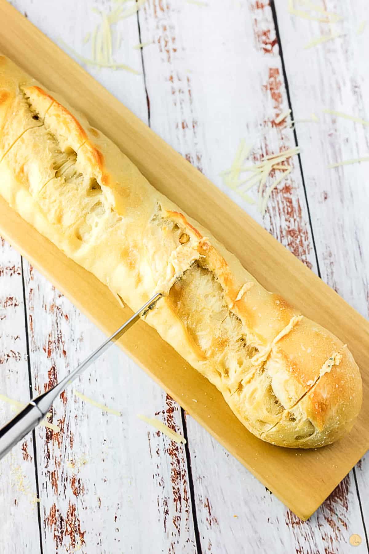 knife slicing bread