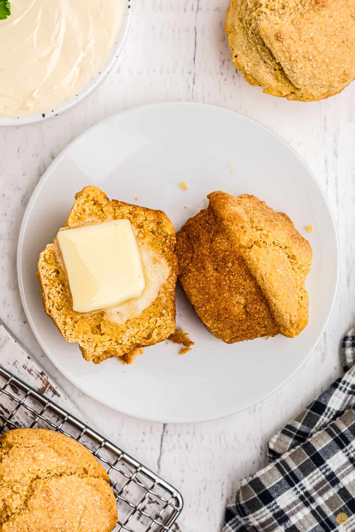 pat of butter on half cornbread muffin