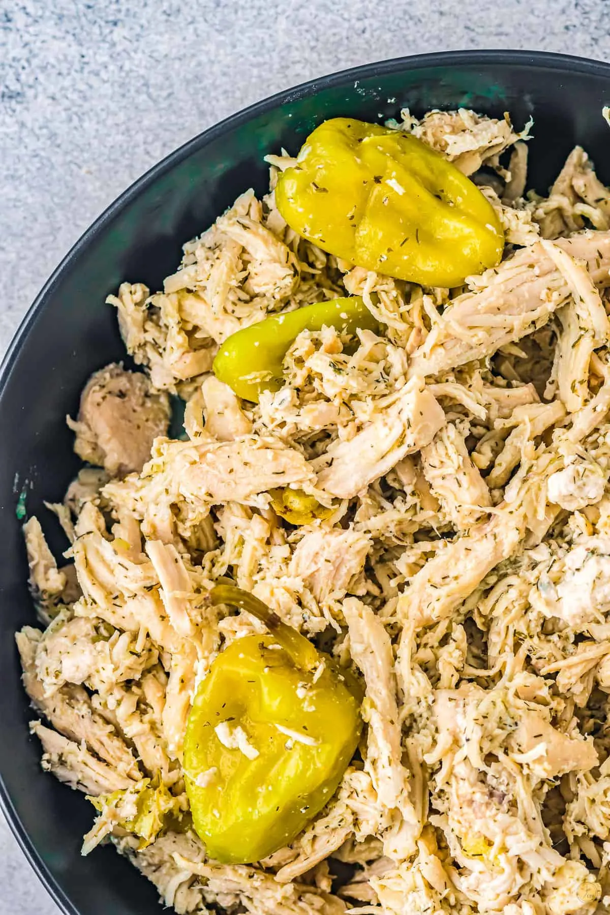 bowl of shredded chicken and peppers