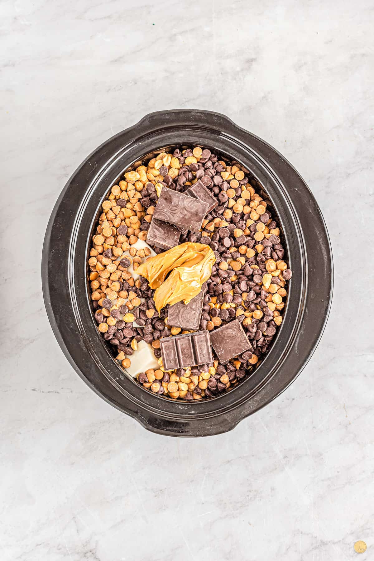 crockpot candy ingredients in a slow cooker