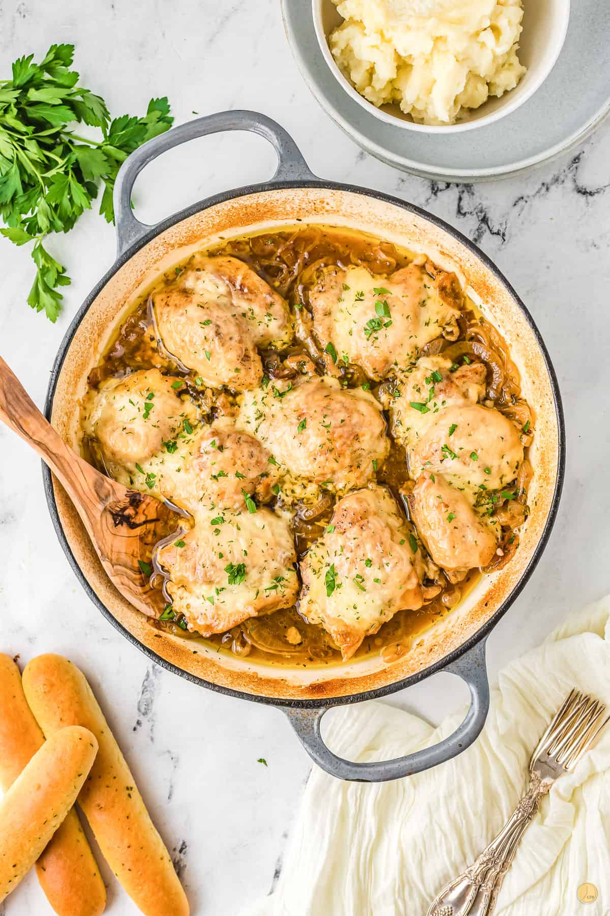 overhead picture of french onion chicken in a skillet