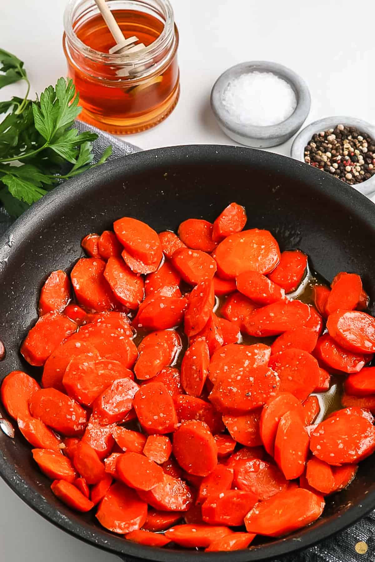 cooked carrots in a pan