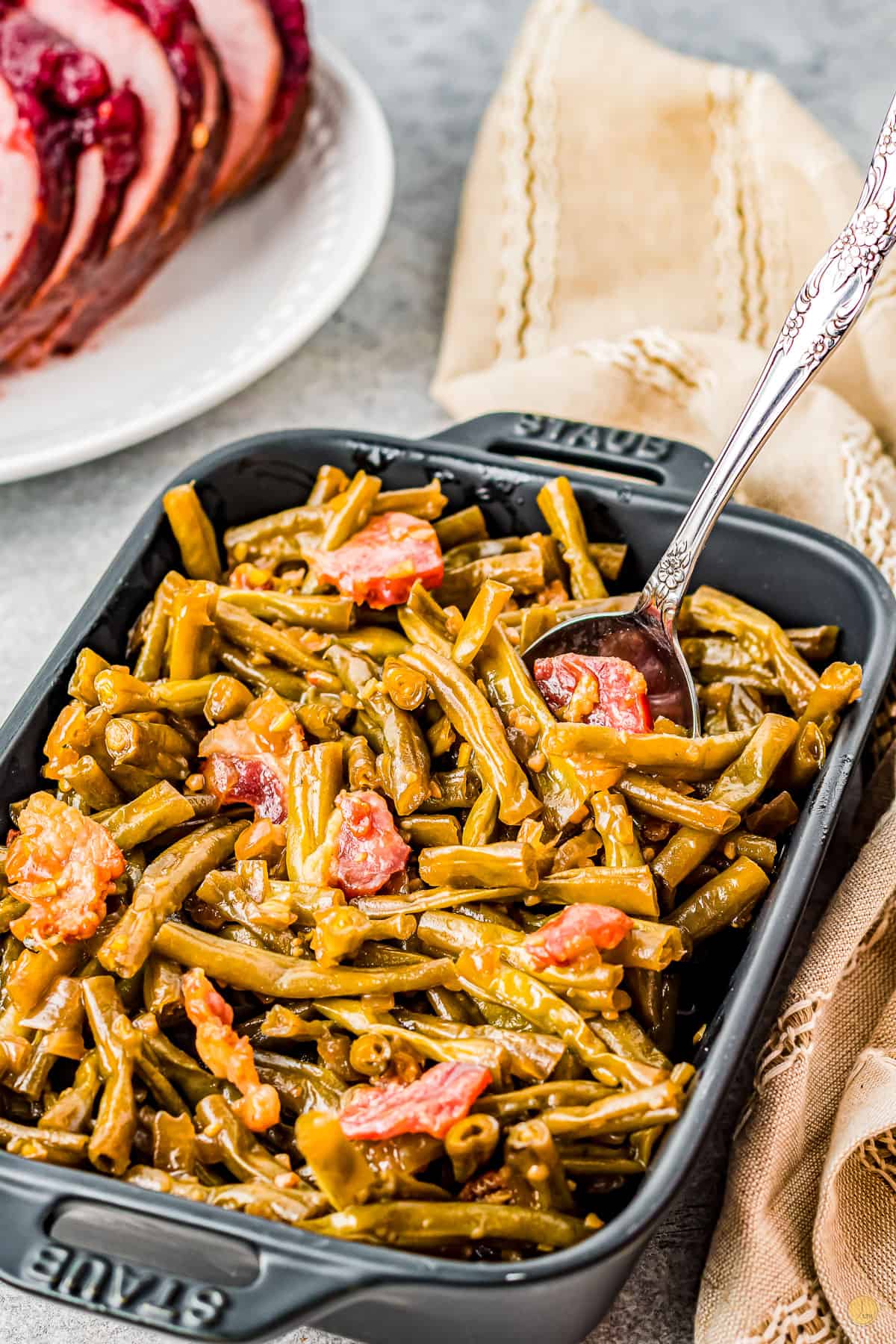 pan of crack green beans with spoon