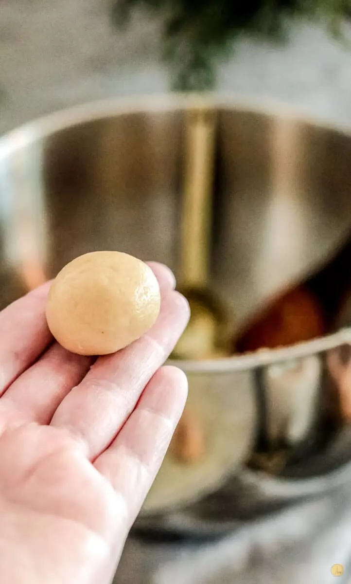 dough ball in hand