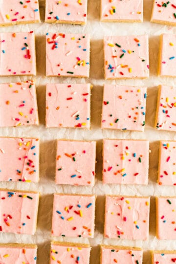 parchment paper with cookie bars on it