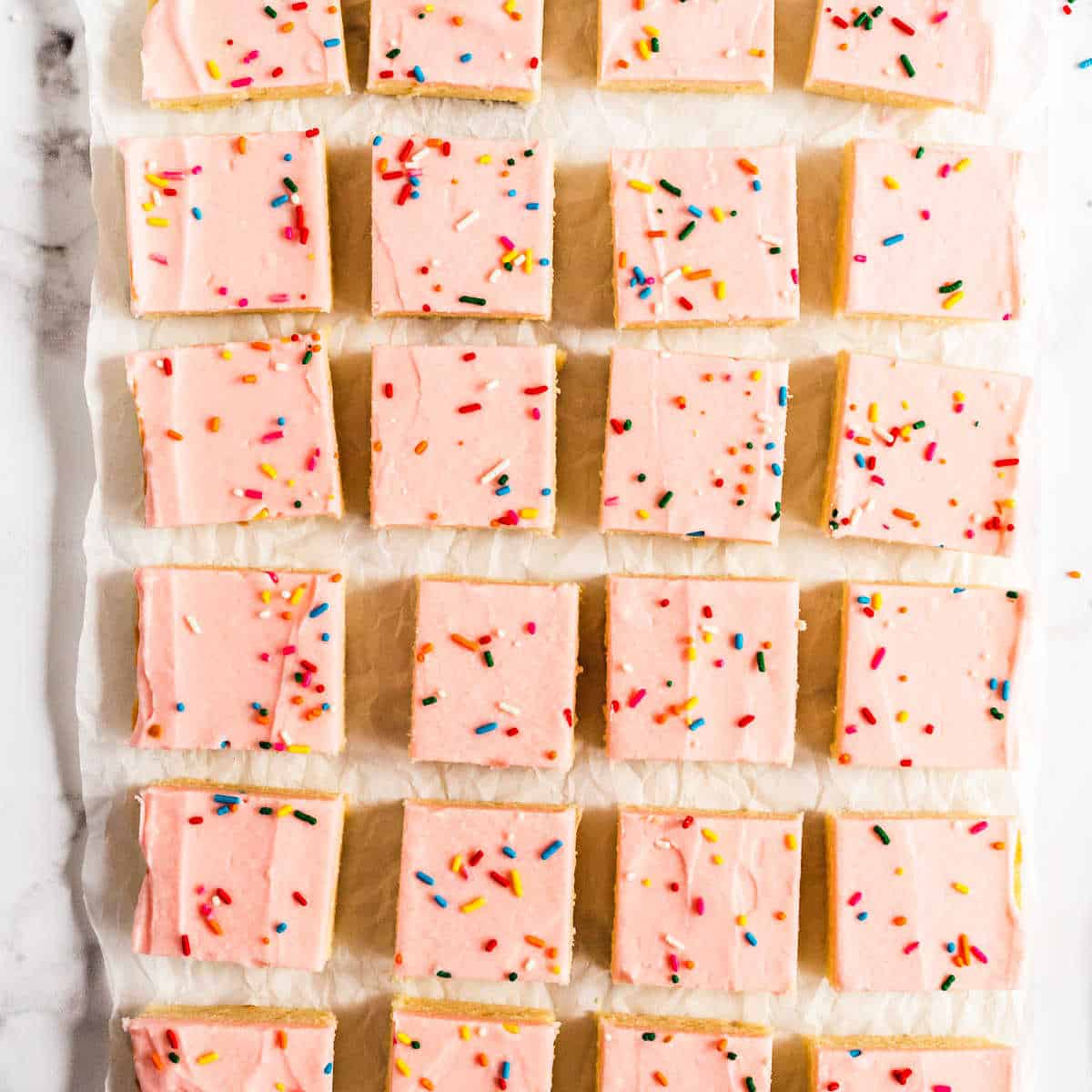 parchment paper with cookie bars on it