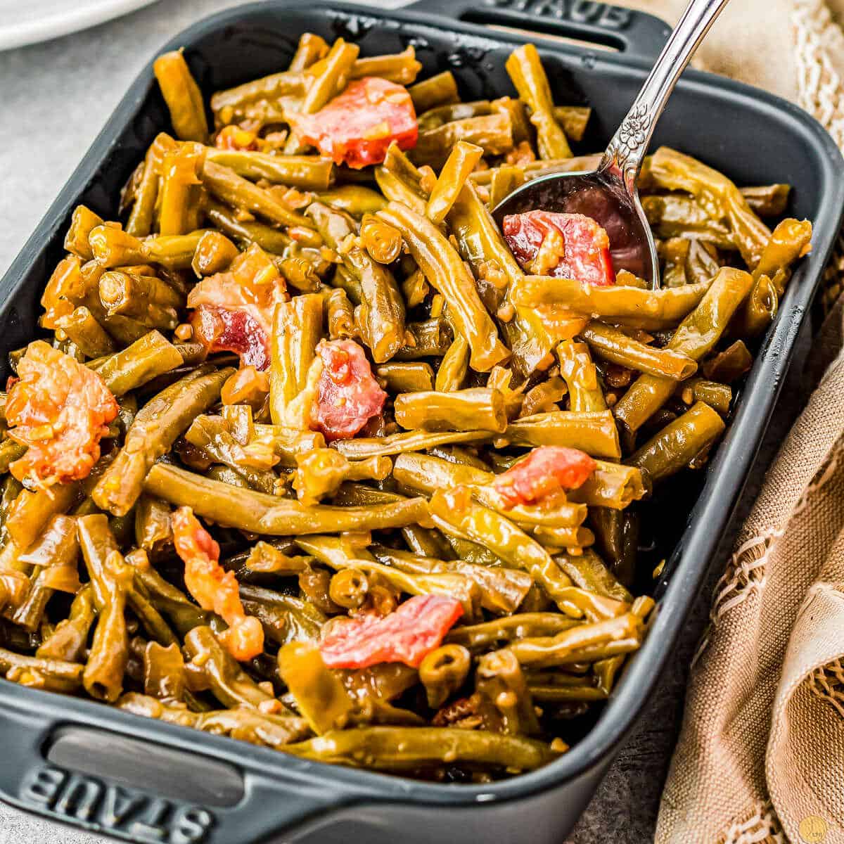 pan of green beans with spoon