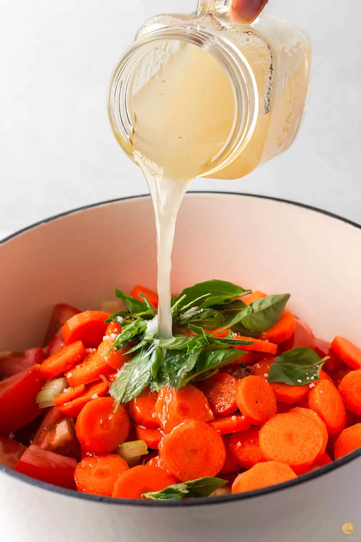 broth pouring in a pot