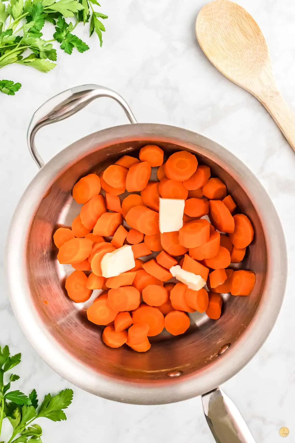 carrots in a pot with butter