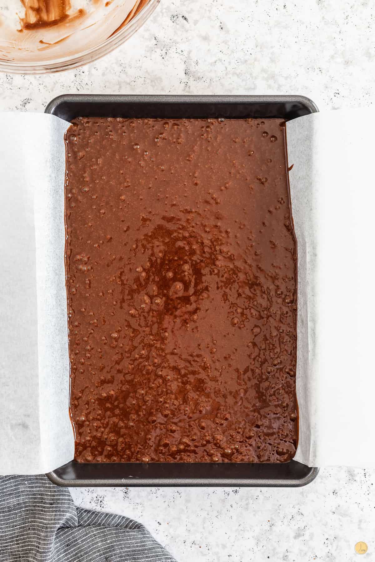 brownie batter in a pan