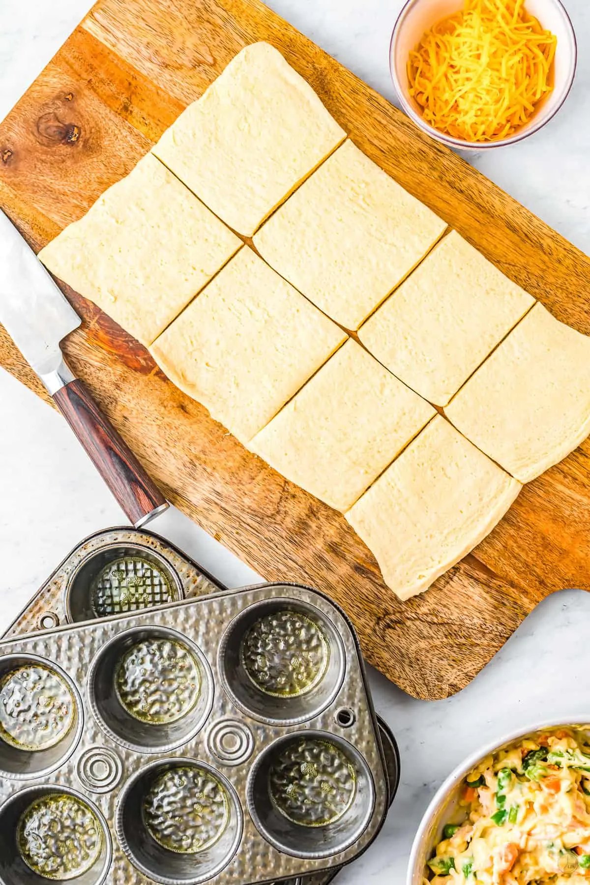 crescent dough on a board cut into squares