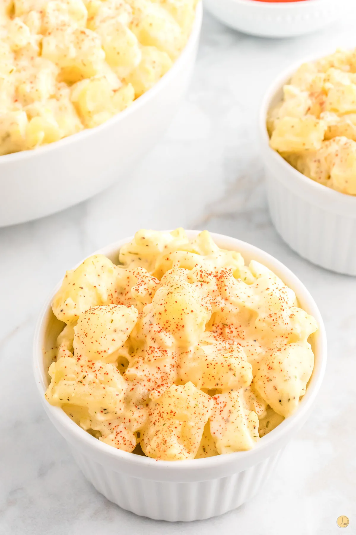 bowl of potato salad that is perfect to serve with meatballs