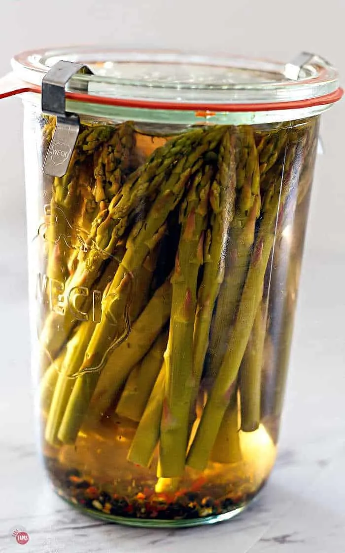 Jar of pickled asparagus. 