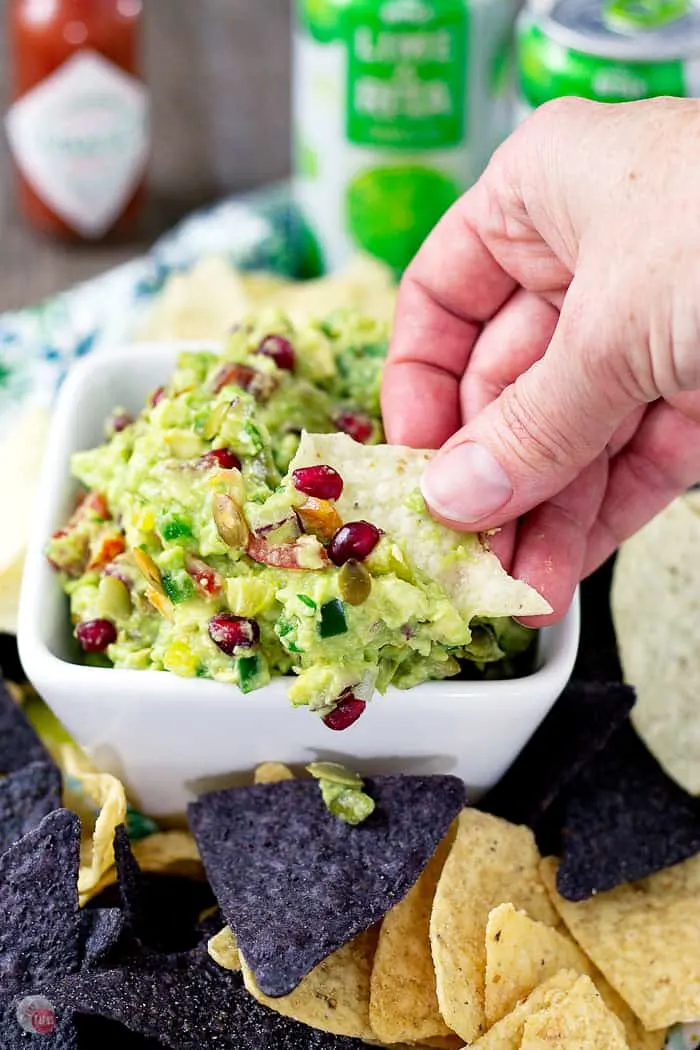 bowl of guacamole and chips