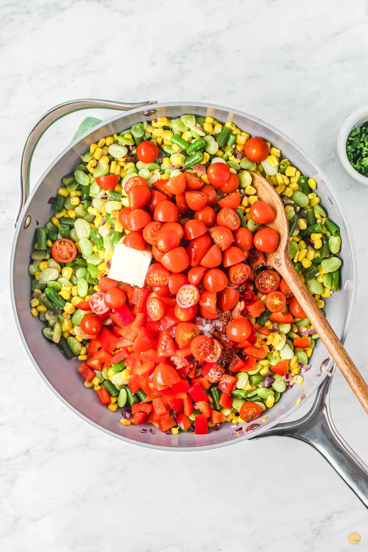 pan with corn and tomatoes