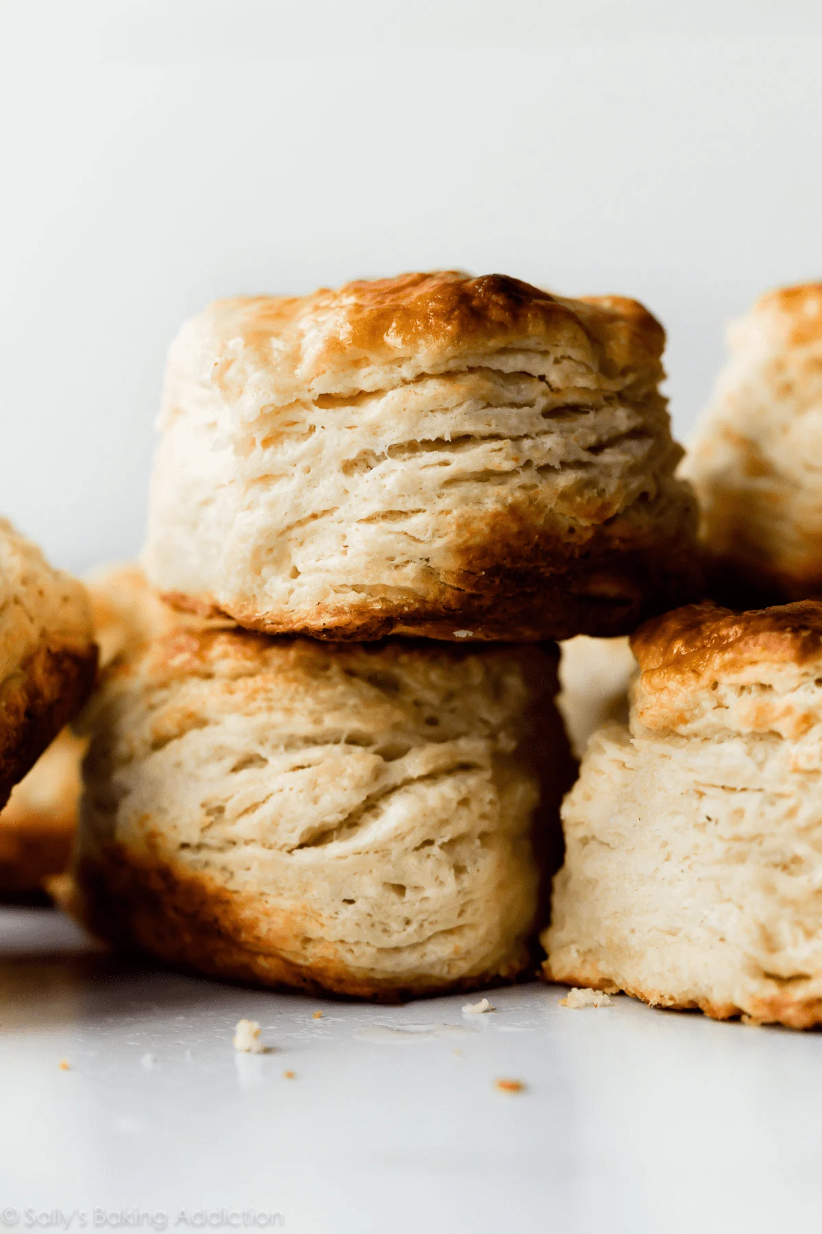 American buttermilk biscuits stacked on a table.