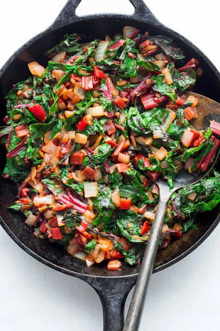 Swiss chard: cooked vegetables and leaves in a skillet. 