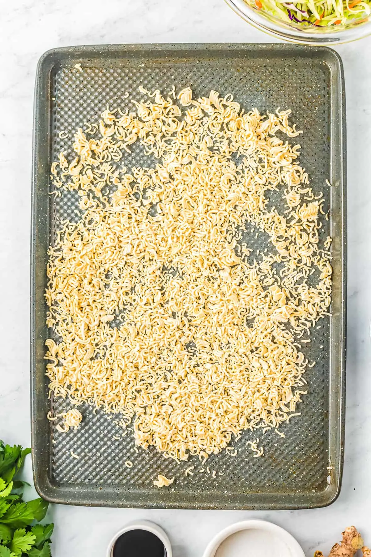 ramen noodles on a baking sheet