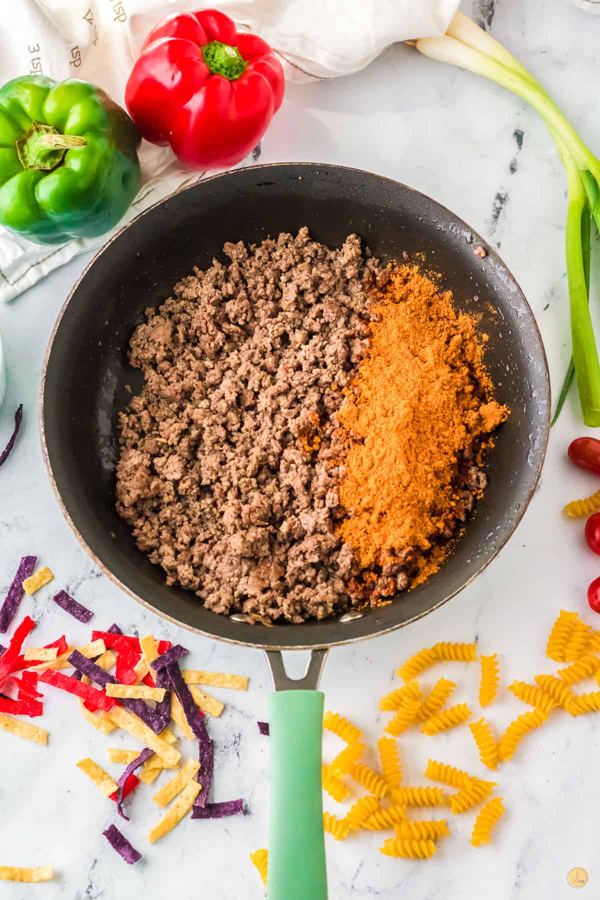 ground beef and spices in a skillet